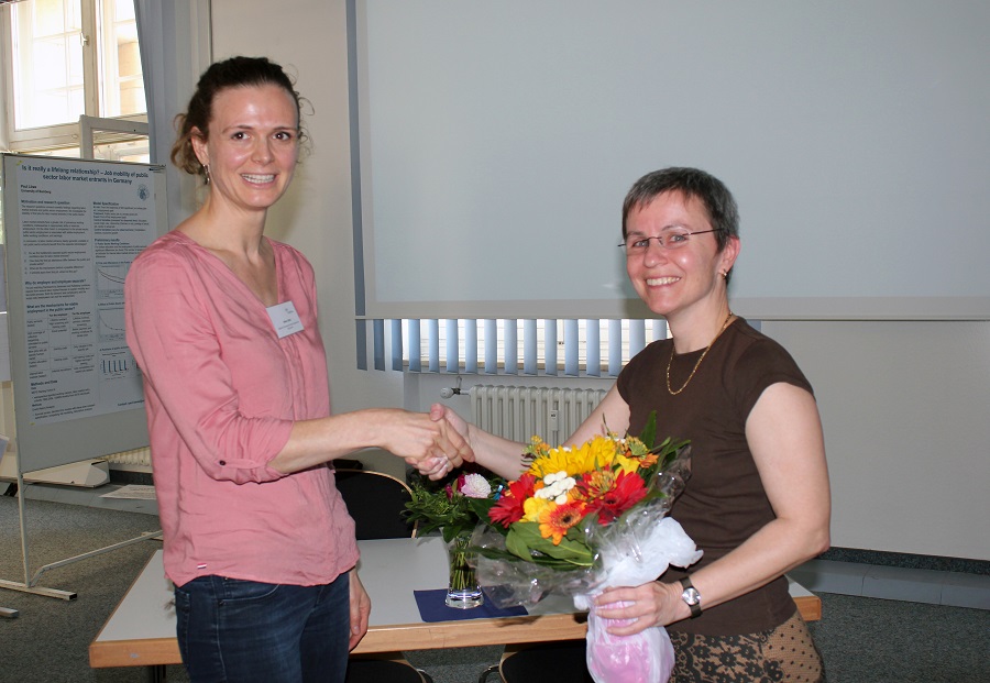 Aileen Edele (left) receives the first NEPS Publication Award from Dr. Jutta von Maurice.  
